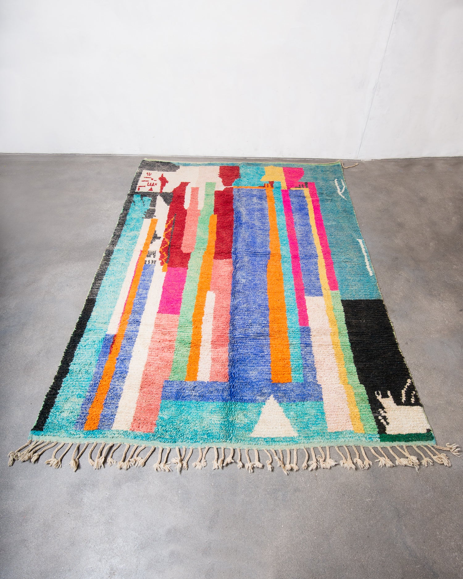 Modern, designer, handcrafted Berber rug from Morocco. Vintage carpet with beautiful colours and patterns and fluffy texture.
